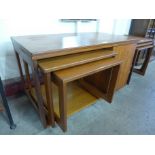 A McIntosh teak trolley swivel top nest of tables