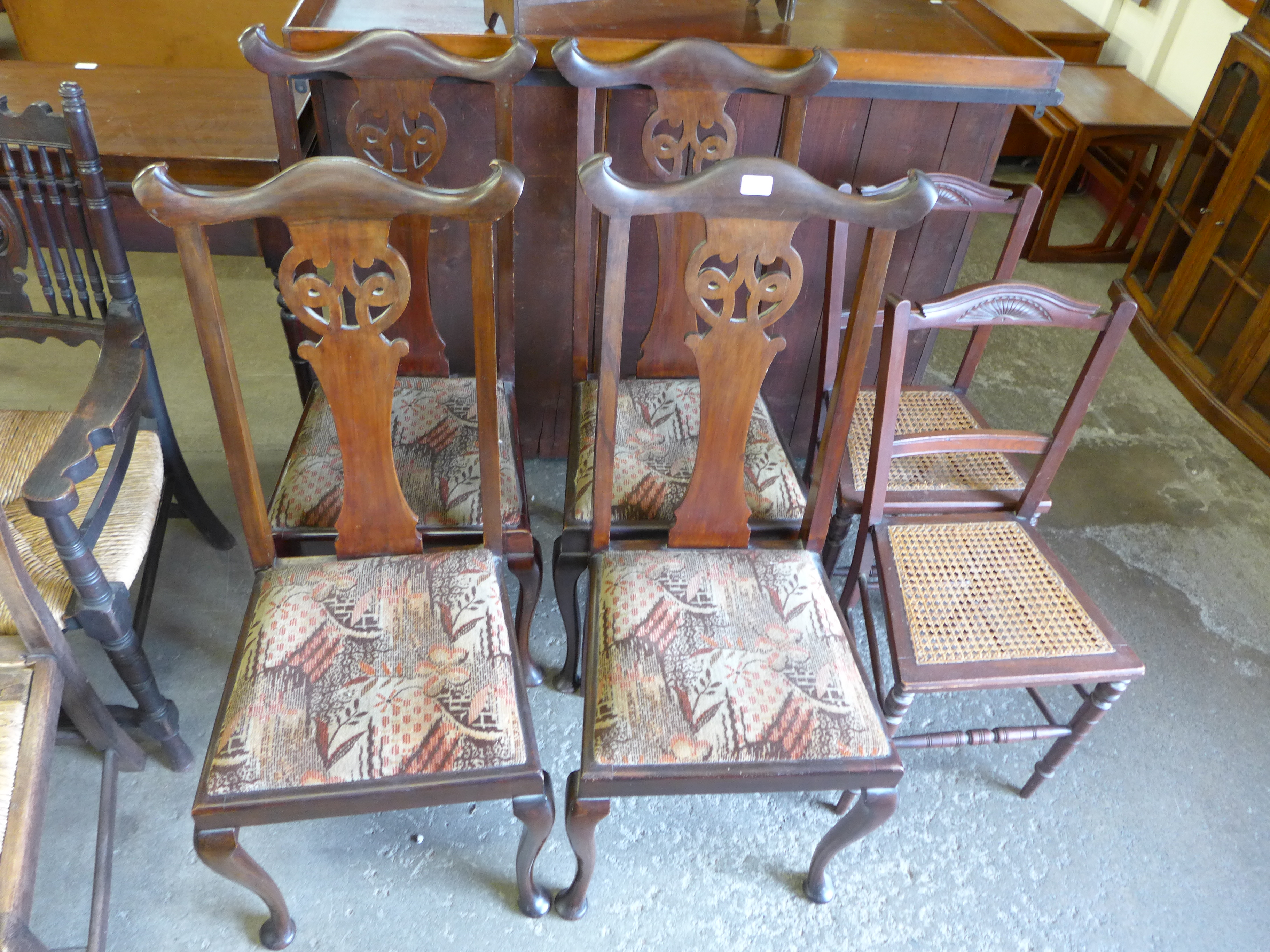 A set of four Queen Ann style dining chairs and two others