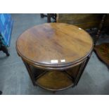 A mahogany teak nest of four tables