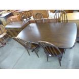 An Ercol six piece dining suite