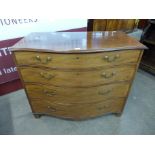 A George III inlaid mahogany serpentine chest of drawers