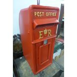 A red Post Office letter box