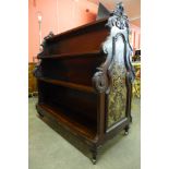 An early Victorian inlaid rosewood double sided bookcase