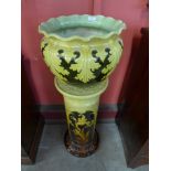 A Leeds Art Pottery jardiniere and stand