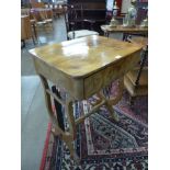 A Victorian walnut sewing table