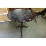 A George III mahogany birdcage circular tripod table