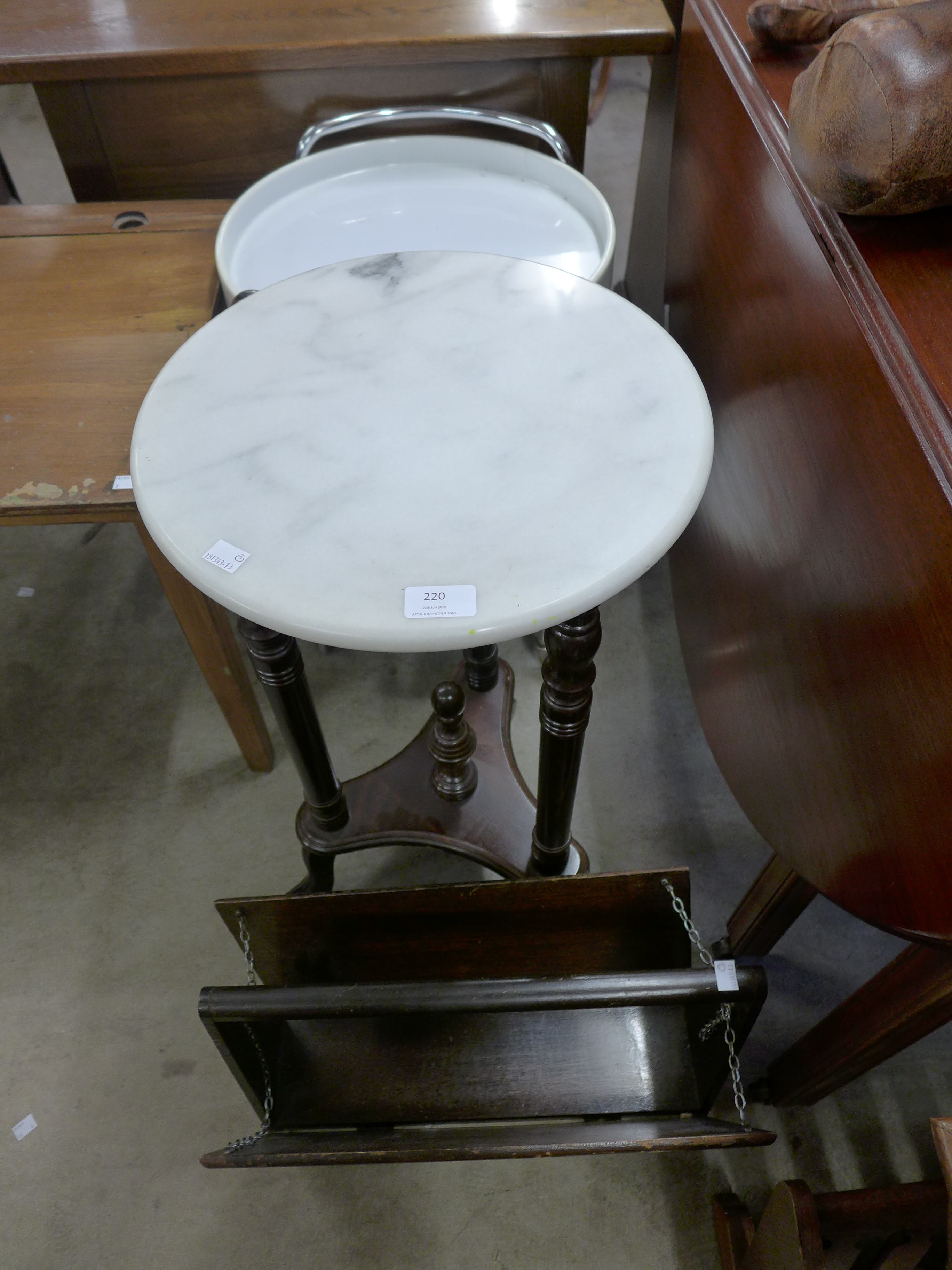 A marble topped jardiniere stand,