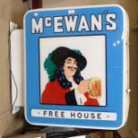 A McEwan's double sided illuminated advertising sign