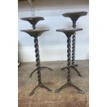 A set of four early 20th Century steel barleytwist shop display stands
