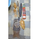 Assorted African carved face masks, etc.