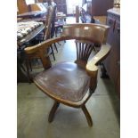 A Victorian oak swivel office chair