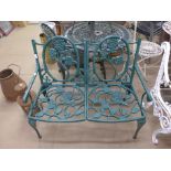 A cast alloy garden bench