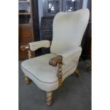 A William IV walnut and upholstered open armchair