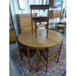 A Mcintosh teak dining table and four chairs