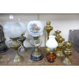 Assorted Victorian and later oil lamps and oil lamp parts