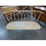 An Ercol lovers seat