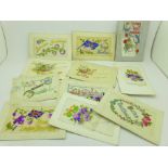 Sixteen silk postcards and a French silk handkerchief