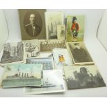 A collection of military postcards and photographs