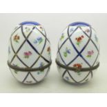 A pair of continental porcelain egg shaped containers