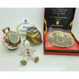 Five items of Royal Crown Derby including an owl paperweight with gold stopper and stripy clown