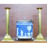 A Wedgwood biscuit barrel and two brass candlesticks