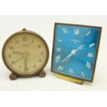 Two travel alarm clocks,