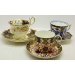 A Royal Crown Derby cup and saucer, one other cup and saucer,