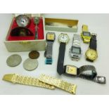 Wristwatches and a christening set