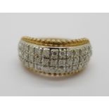 A 9ct gold three row forty-one diamond ring, 7.