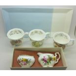 A Royal Doulton tray, three Royal Doulton Brambly Hedge items, boxed,