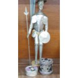 A metal figure of soldier in armour and two lidded boxes,