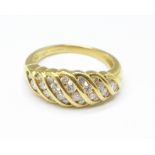 An 18ct gold and diamond ring, 0.5ct diamond weight marked on the shank, 5.