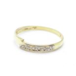 A 9ct gold and diamond ring, 0.