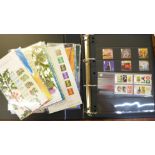 A partially complete album of Royal Mail mint stamps and twenty Royal Mail Post & Go stamp sets,