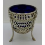 A pierced sterling silver bowl with blue glass liner, London 1900, 237g, height 10.