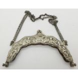 A white metal purse top marked with a lion, possibly Dutch, tests as silver,