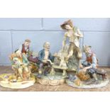 Two Capodimonte figures and two similar and a Naturecraft Companions figure,