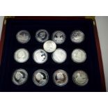 A case containing twelve silver proof coins,