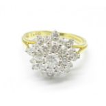 An 18ct gold and diamond cluster ring, 1ct diamond weight marked on the shank, 409g,