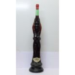 A large 3 litre novelty bottle of Monticello Chianti in the form of a lady holding a bottle,