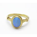 An 18ct gold and opal ring, 5.