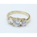 A 9ct gold three stone ring, 3.