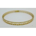 A 14ct gold bangle, 7.