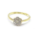 An 18ct gold and diamond ring, 1.