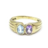 A 9ct gold, amethyst and topaz ring, 3.