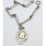 A silver Albert chain with Victorian silver fob medal,