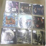 Twelve Rolling Stones LP records including an EP, and original issues, one sleeve with mis-print,