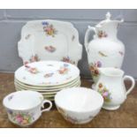 A collection of Coalport china, decorated with sprays of flowers,
