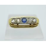 A 14ct gold Art Deco ring set with four diamonds and one sapphire, 4.