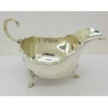 A silver sauce boat,